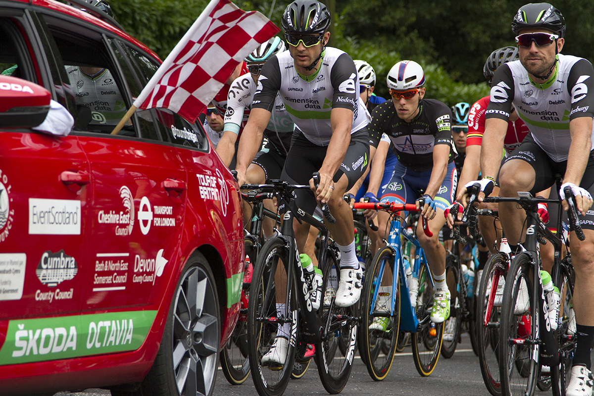 Tour of Britain 2016 - The start flag sticks out of the race car at the beginning of the race in Bristol