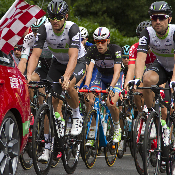 Tour of Britain 2016 - The start flag sticks out of the race car at the beginning of the race in Bristol