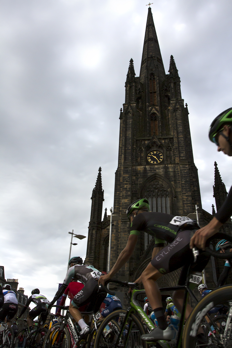 Tour of Britain 2017 - Riders pass a church in Edinburgh at the start of the Tour of Britain