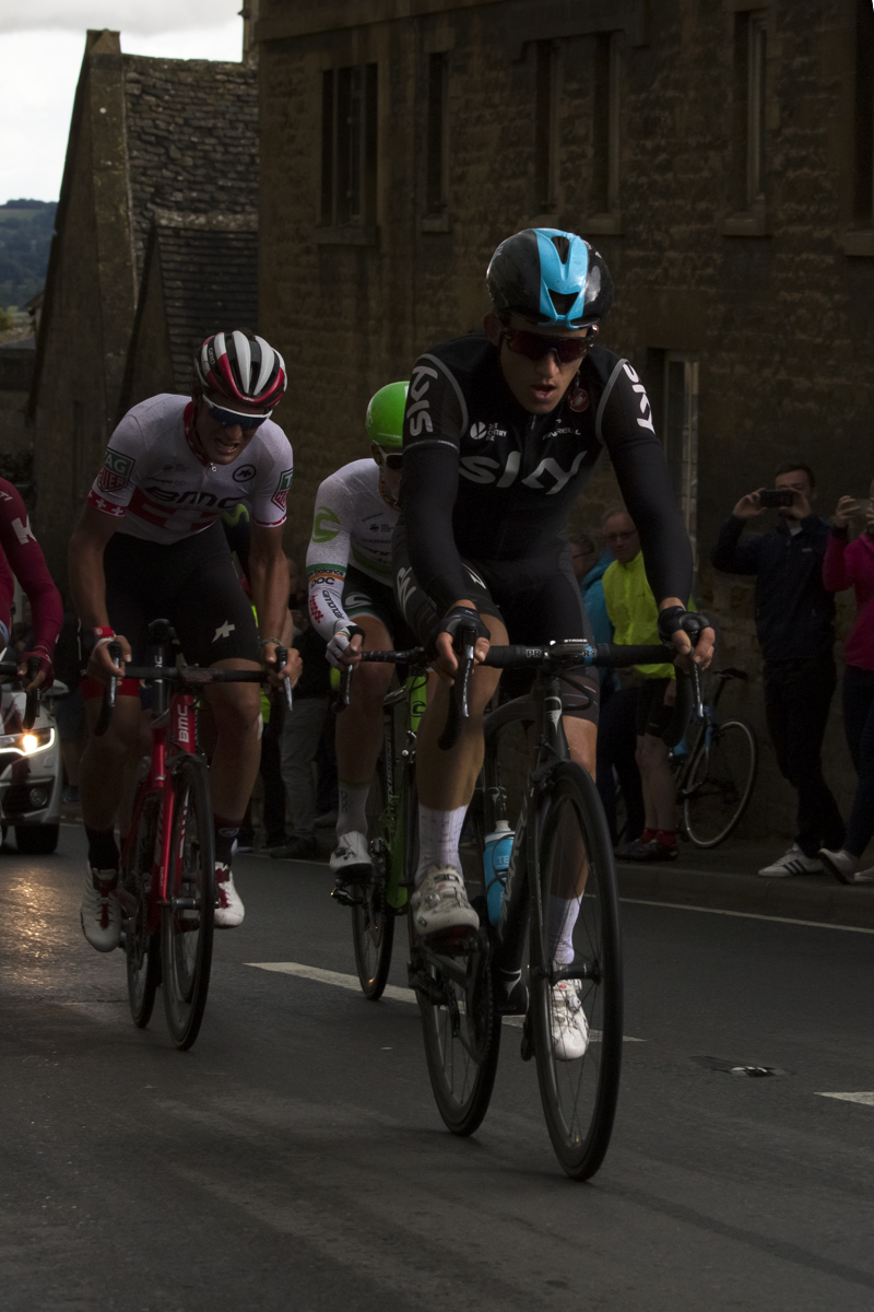 Tour of Britain 2017 - Michal Kwiatkowski of Team Sky climbs through a heavy shower at Bourton-on-the-Hill