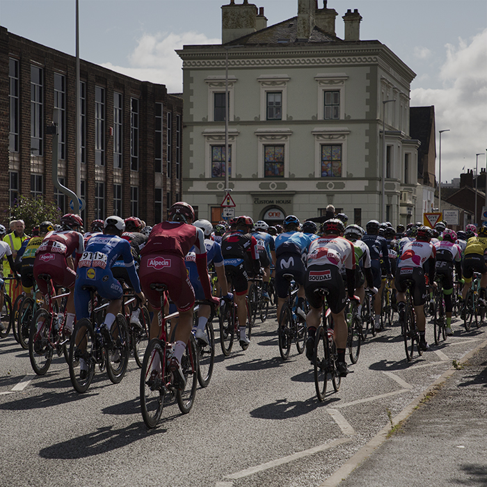 Tour of Britain 2018 - The peloton rolls past fans on its way out of Barrow-in Furness