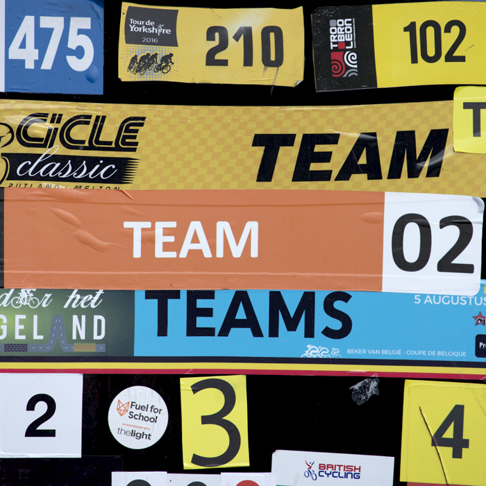 Stickers from different races on the inside of the Madison Genesis team bus