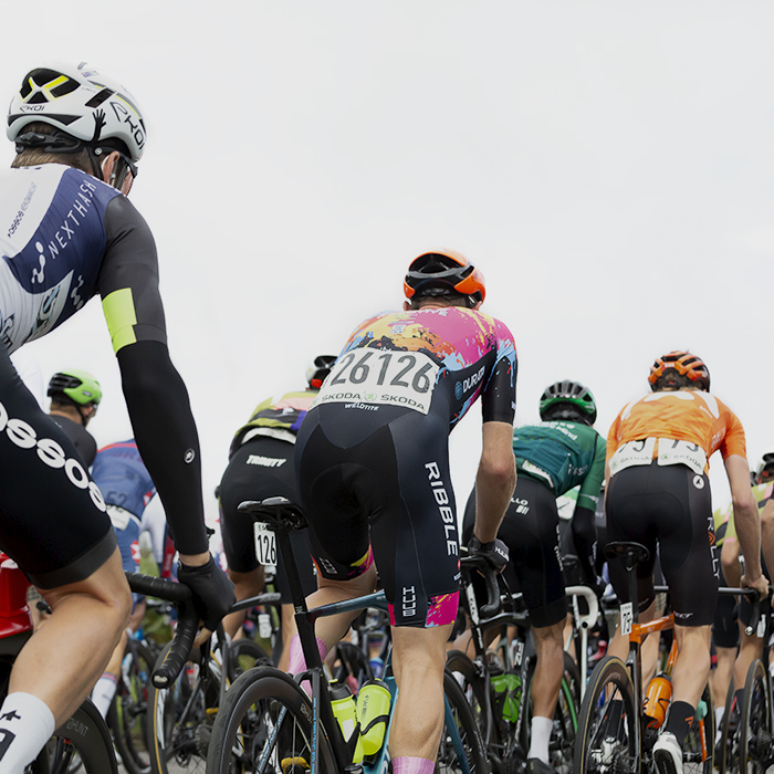 Tour of Britain 2021 - The rear of the peloton as it rides away on its way up Cairn O’Mount