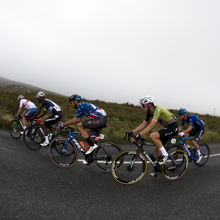 Tour of Britain 2021 - The breakaway pass through moorland with Watch Croft hill in the background