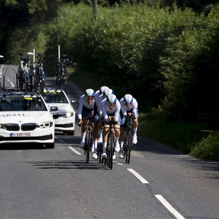 Tour of Britain 2021 - Team Time Trial - Israel Start-Up Nation are followed by their support vehicles through the roads of Carmarthernshire