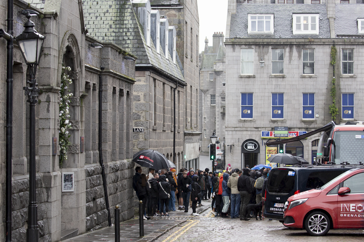 Tour of Britain 2022 - Crowds gather around the INEOS bus in Aberdeen before the start of Stage 1