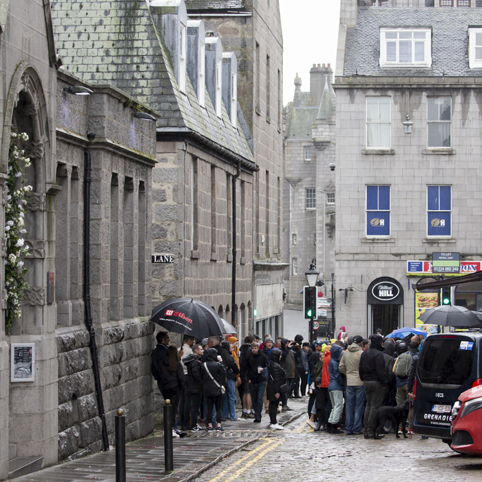 Tour of Britain 2022 - Crowds gather around the INEOS bus in Aberdeen before the start of Stage 1