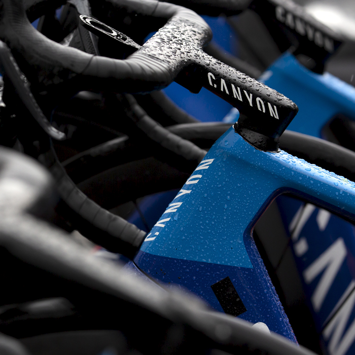 Tour of Britain 2022 - A close up of Canyon bike handlebars in the rain