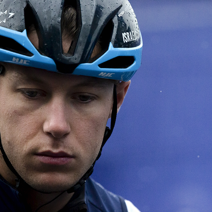 Tour of Britain 2022 - Corbin Strong of Israel - Premier Tech waits for the race to start as the rain falls