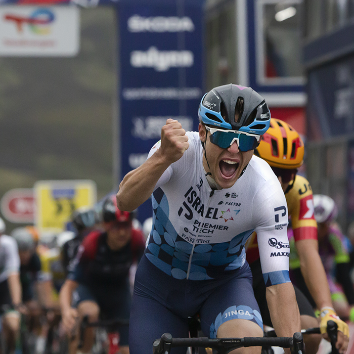 Tour of Britain 2022 - Corbin Strong clenches his fist and roars in celebration as he crosses the line as winner of the first stage