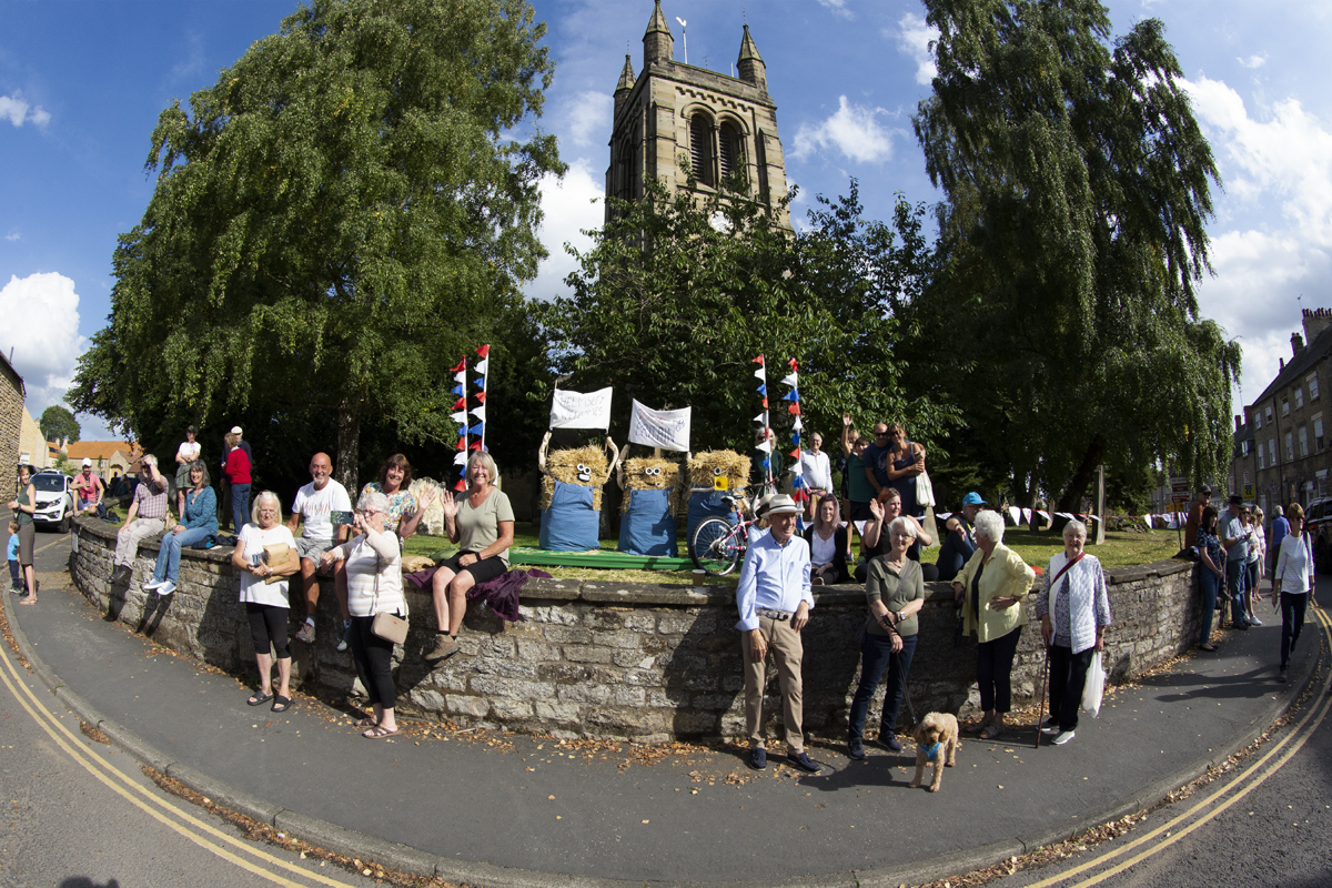 Tour of Britain 2022 - Fans in Helmsley outside the church