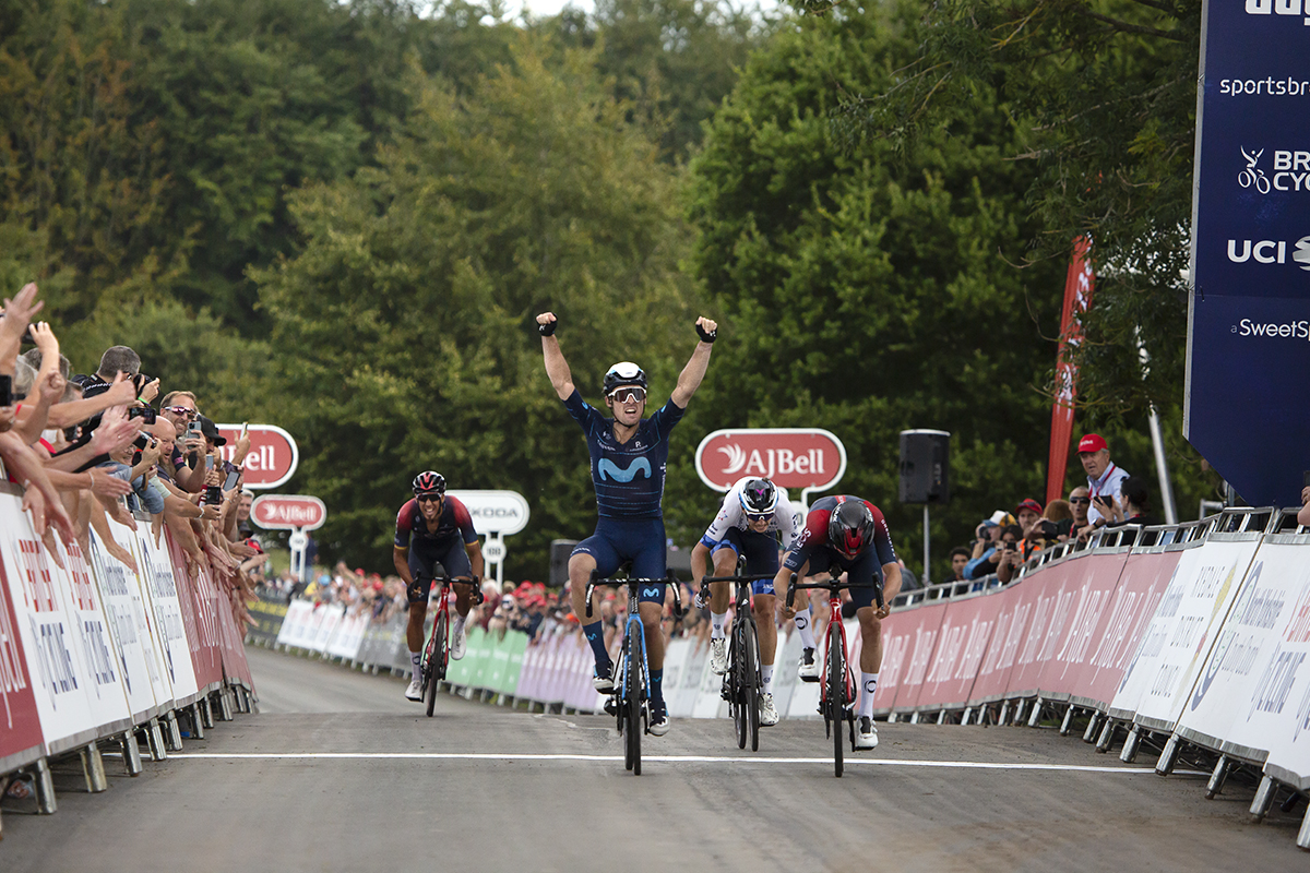 Tour of Britain 2022 - Gonzalo Serrano of Movistar Team crosses the finish line with his arms raised in victory at the end of stage 4 in Helmsley