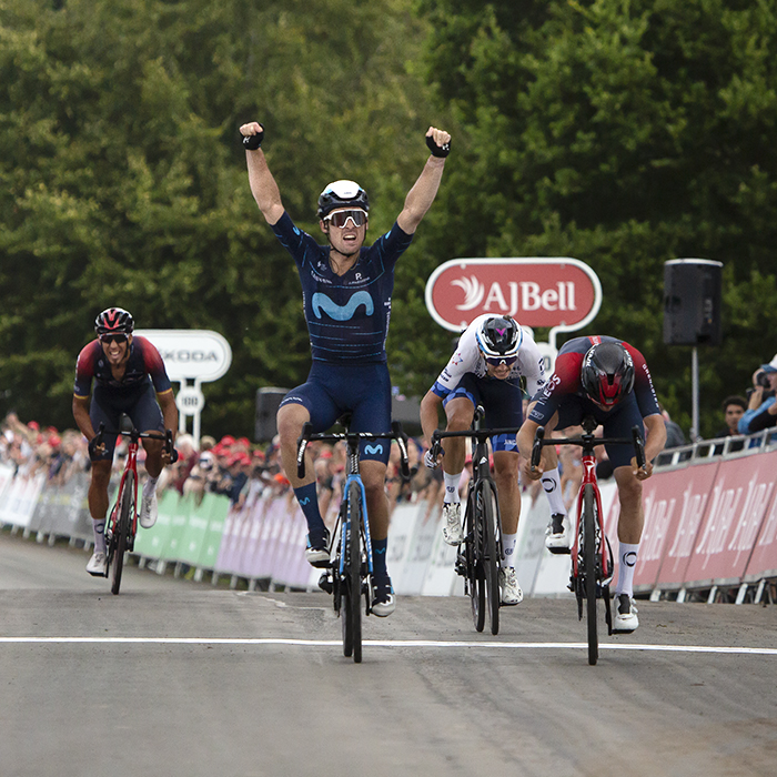 Tour of Britain 2022 - Gonzalo Serrano of Movistar Team crosses the finish line with his arms raised in victory at the end of stage 4 in Helmsley