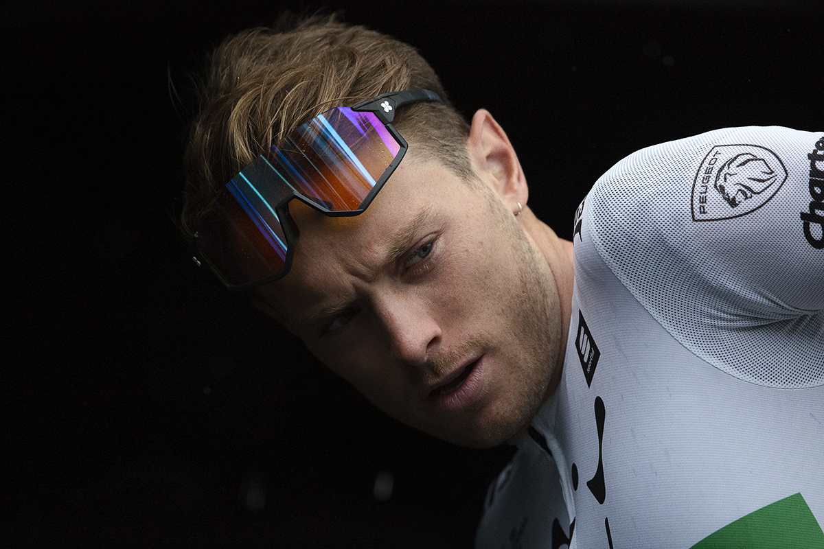 Tour of Britain 2022 - Rory Townsend of WiV SunGod puts on his Irish Champions Jersey before the start of the race