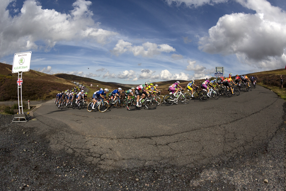 Tour of Britain 2022 - The peloton take on a switchback before tackling the climb of Mainslaughter Law