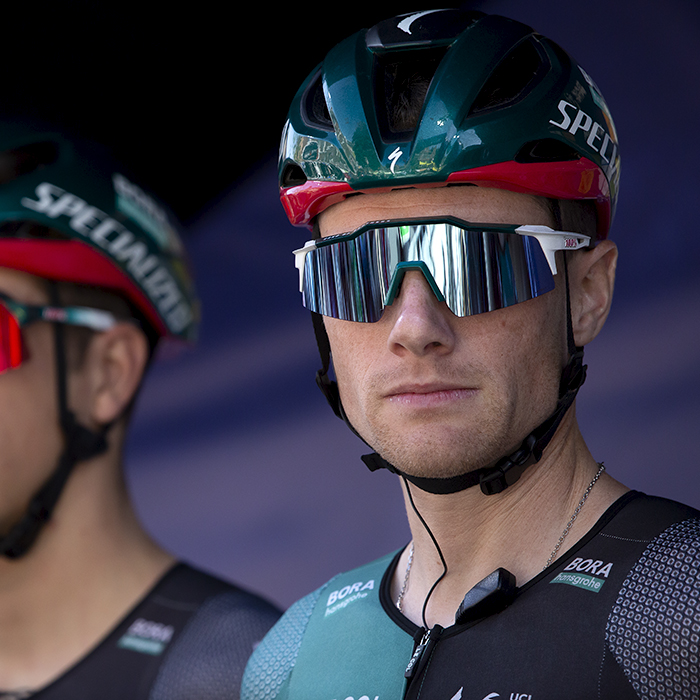 Tour of Britain 2023 - Sam Bennett of BORA - hansgrohe glances from the podium towards the camera before the start of the race