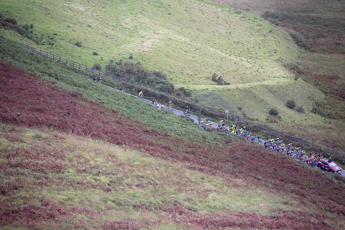 Tour of Britain 2023 - Riders seen from above with moorland in the foreground