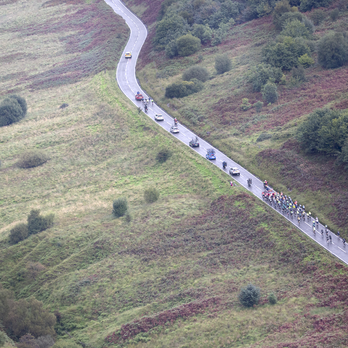 Tour of Britain 2023 - The road snakes round the corners as the riders tackle Bwlch Mountain