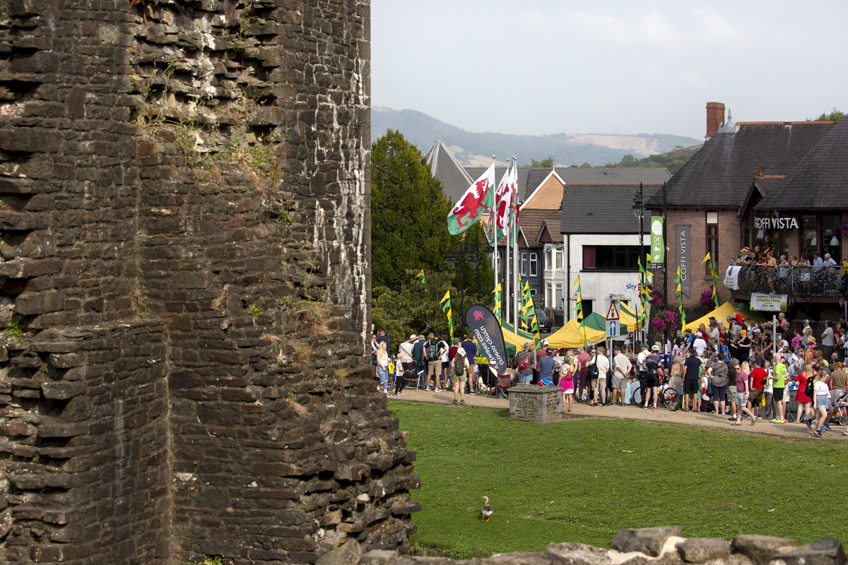 Tour of Britain 2023 - Caerphilly Castle is seen in the foreground as spectators wait for the race to arrive