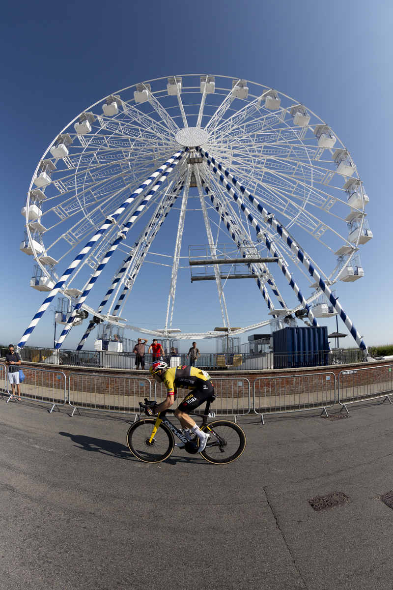 Tour of Britain 2023 - Wout van Aert of Jumbo-Visma passes by a Ferris Wheel on his way to winning the stage