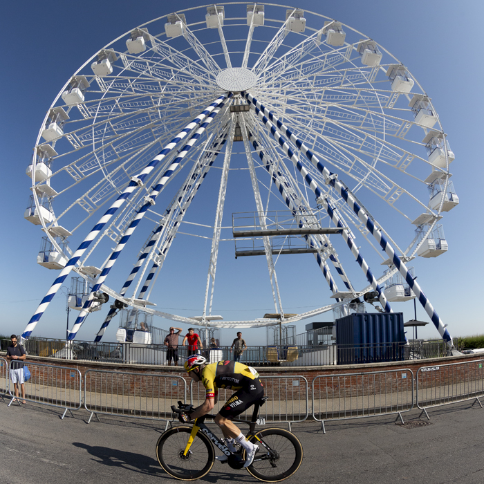 Tour of Britain 2023 - Wout van Aert of Jumbo-Visma passes by a Ferris Wheel on his way to winning the stage