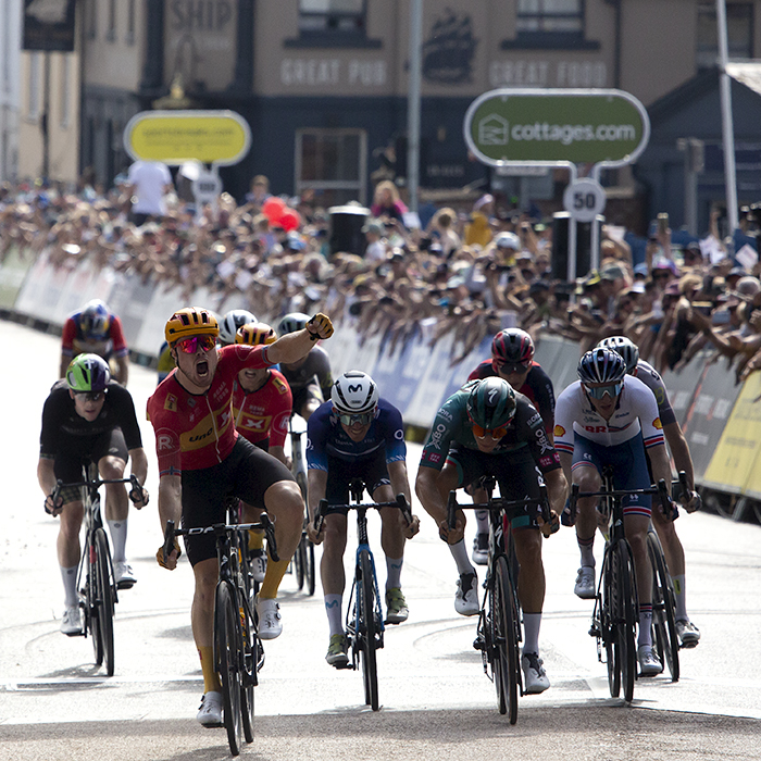 Tour of Britain 2023 - Rasmus Tiller of Uno-X Pro Cycling Team punches the air in victory as he takes the stage win