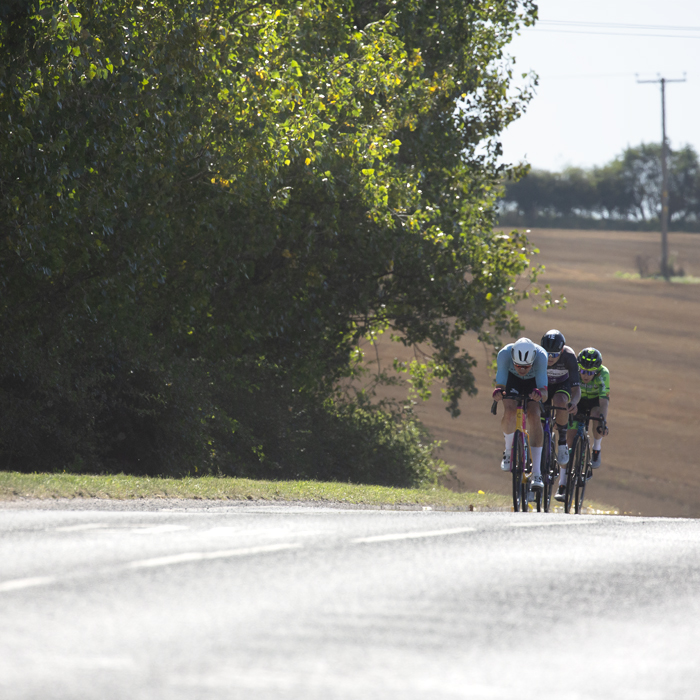 Tour of Britain 2023 - The breakaway crests a hill in the Yorkshire Wolds