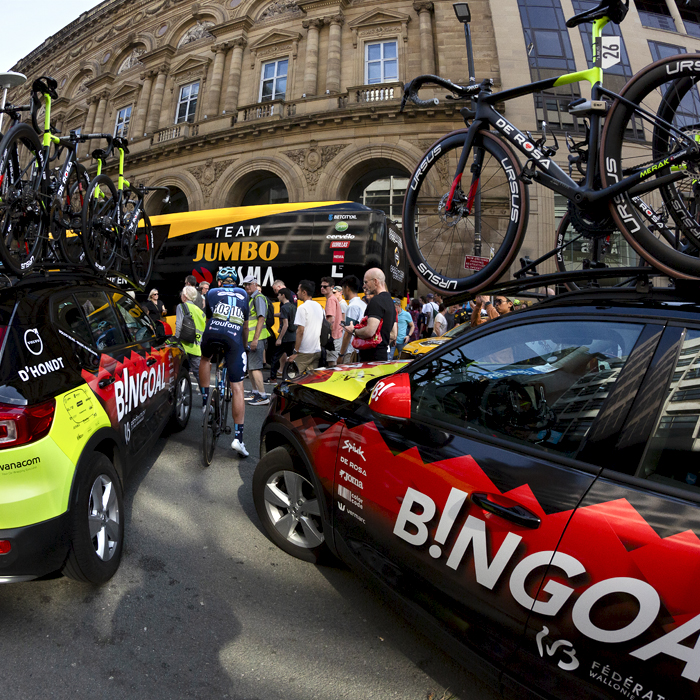 Tour of Britain 2023 - Team buses and team cars in the streets of central Manchester