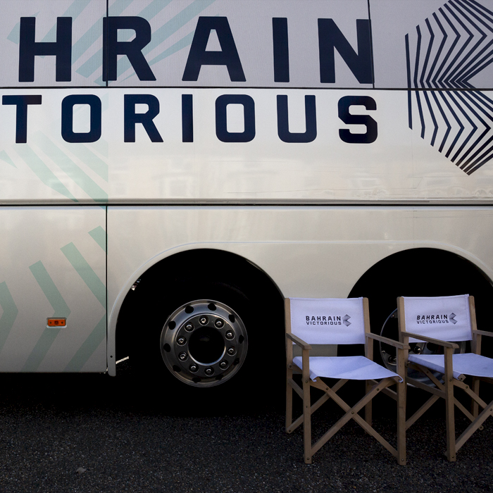 Tour of Britain 2024 - Director’s chairs set up outside the Bahrain Victorious bus