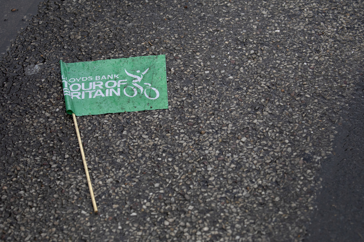 Tour of Britain 2024 - A tour of Britain Flag lies sodden on the ground at the end of the race