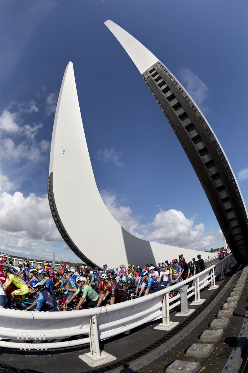 Tour of Britain 2024 - The newly opened Gull Wing Bridge in Lowestoft greets the riders on their way out of town