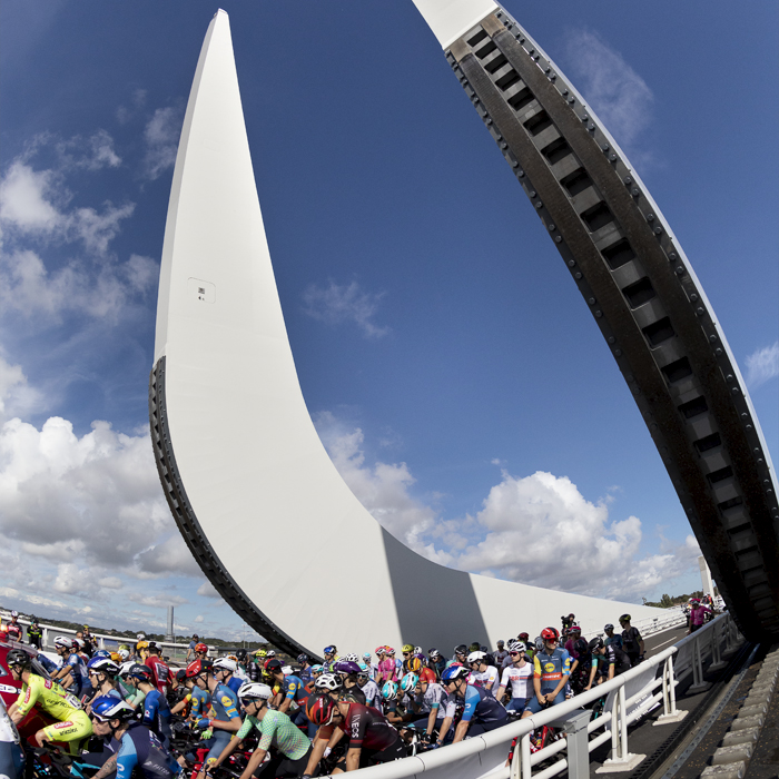 Tour of Britain 2024 - The newly opened Gull Wing Bridge in Lowestoft greets the riders on their way out of town