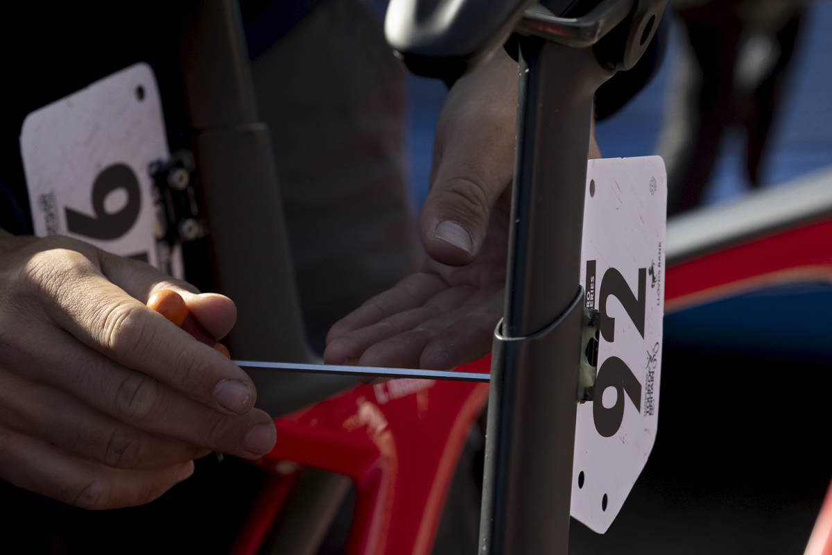 Tour of Britain 2024 - A mechanic makes last minute adjustments to Martin Pedersen’s bike