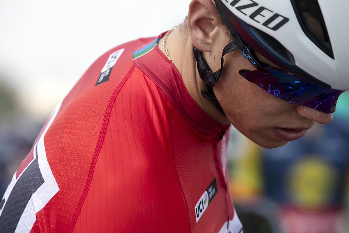 Tour of Britain 2024 - Paul Magnier wearing the red points jersey on the start line before Stage 4