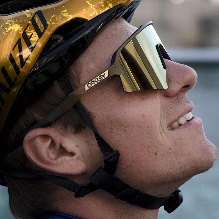 Tour of Britain 2024 - Remco Evenepoel tilts his head back and looks to the sky showing off his golden helmet as Olympic Road Race Champion