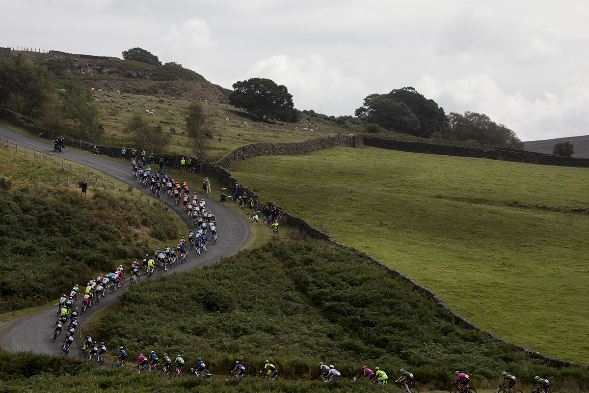 Tour of Britain 2024 - A line of riders snakes up the uncategorised climb of Sleddale Bank