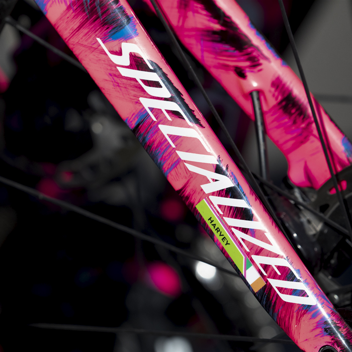 Tour of Britain 2024 - An Irish tricolour adorn Dean Harvey’s pink Specialized bike forks