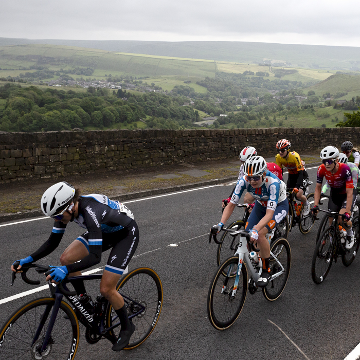 Tour of Britain Women’s 2024 - Riders tackle the Grains Bar climb with the countryside in the background