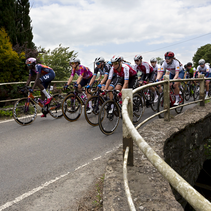 Tour of Britain Women’s 2024 - Riders cross a small bridge at Llanfyllin