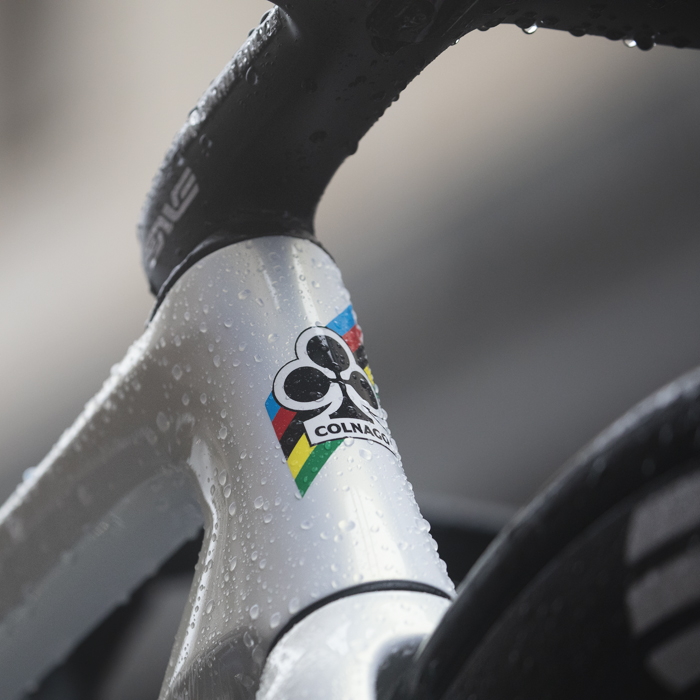 Tre Valli Varesine 2024 - Close up of the Colnago logo and rainbow bands on the bike
