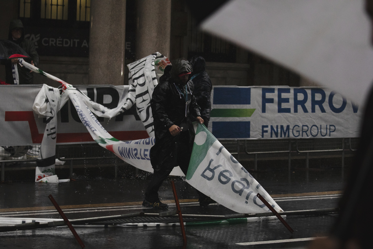 Tre Valli Varesine 2024 - Varese - Race officials battle the elements as they remove elements of the course damaged by the weather