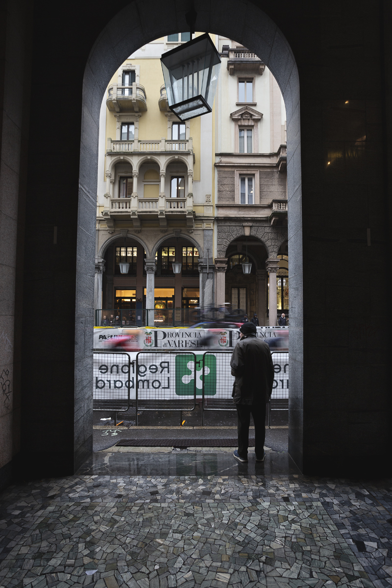 Tre Valli Varesine Women’s Race 2024 - Varese - Banners advertising the Provincia di Varese seen through the archway of a colonnade