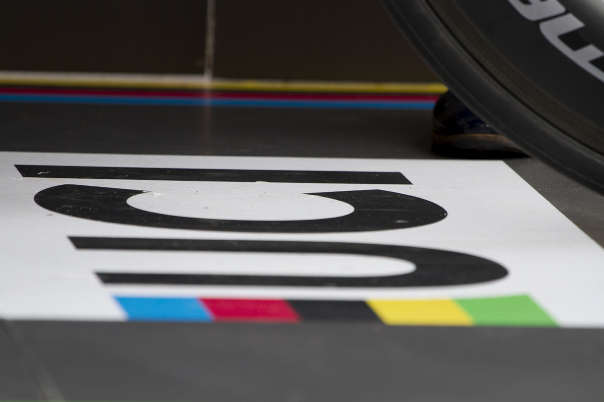 UCI 2019 Road World Championships - A time trial bike wheel approaches the UCI logo at the start of the Time Trial