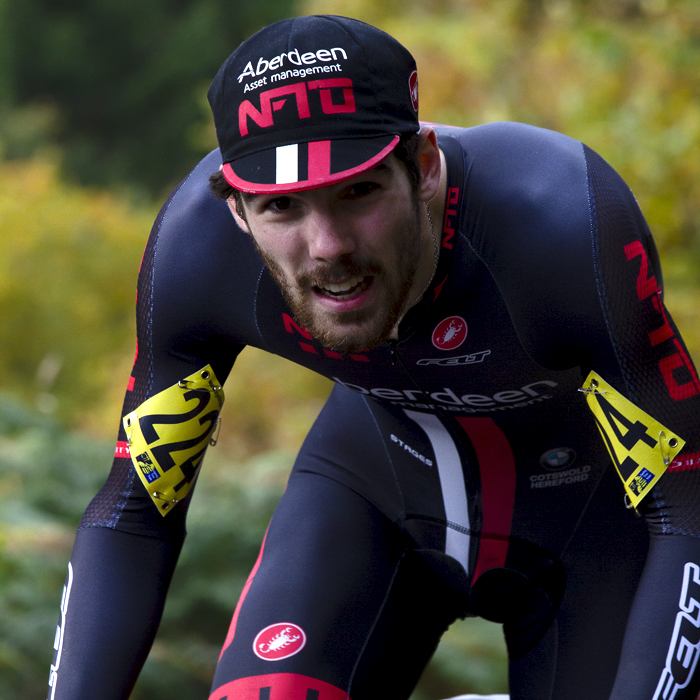 UK National Hill Climb Championships 2015 - Edmund Bradbury looks up the hill with autumnal colours seen behind him