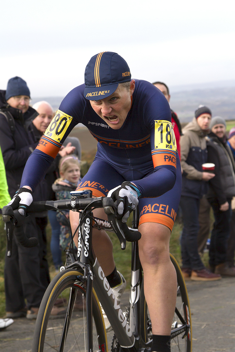 UK National Hill Climb Championships 2015 - Maryka Sennema, face contorted with effort forces her way to the top of the climb