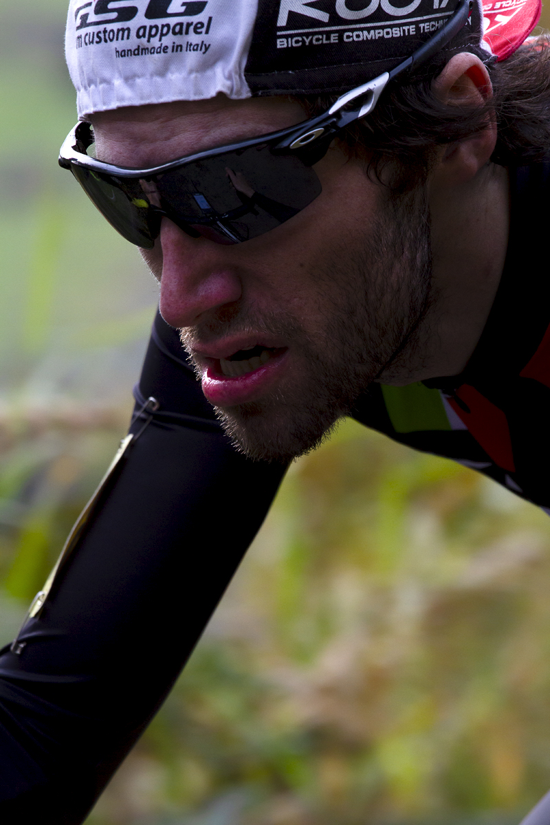 UK National Hill Climb Championships 2015 - Mathew Cartlidge wearing sunglasses with a small cycling cap on backwards