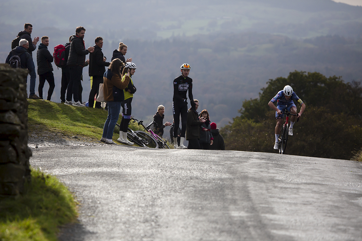 UK National Hill Climb Championships 2023 - Ben Millar puts his head down as he passes a group of supporters