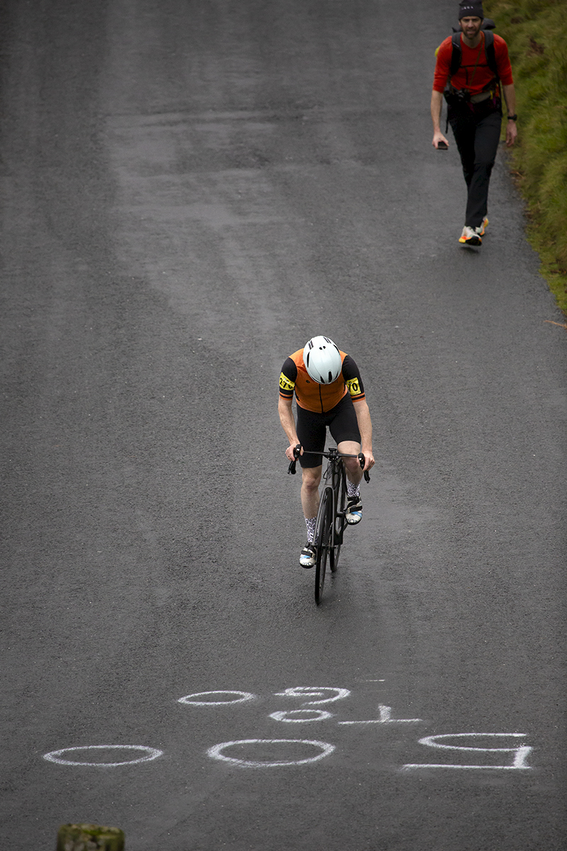 UK National Hill Climb Championships 2023 - Bruce Morris from above as he approaches writing on the road reading 500 To Go