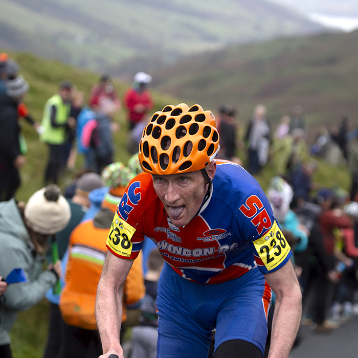 UK National Hill Climb Championships 2023 - Marc Allen sticks out his tongue and makes one final effort on his way to the finish