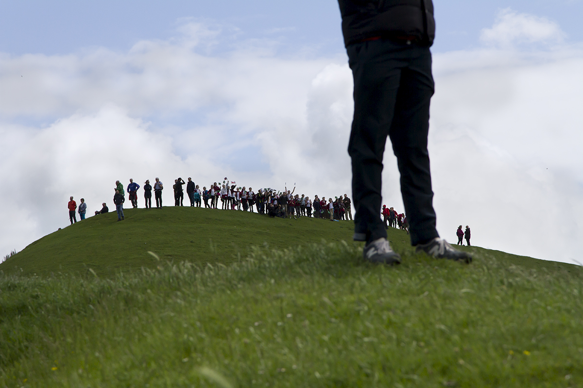 Women’s Tour 2017 - fans can be seen lining the summit of a hill during the race